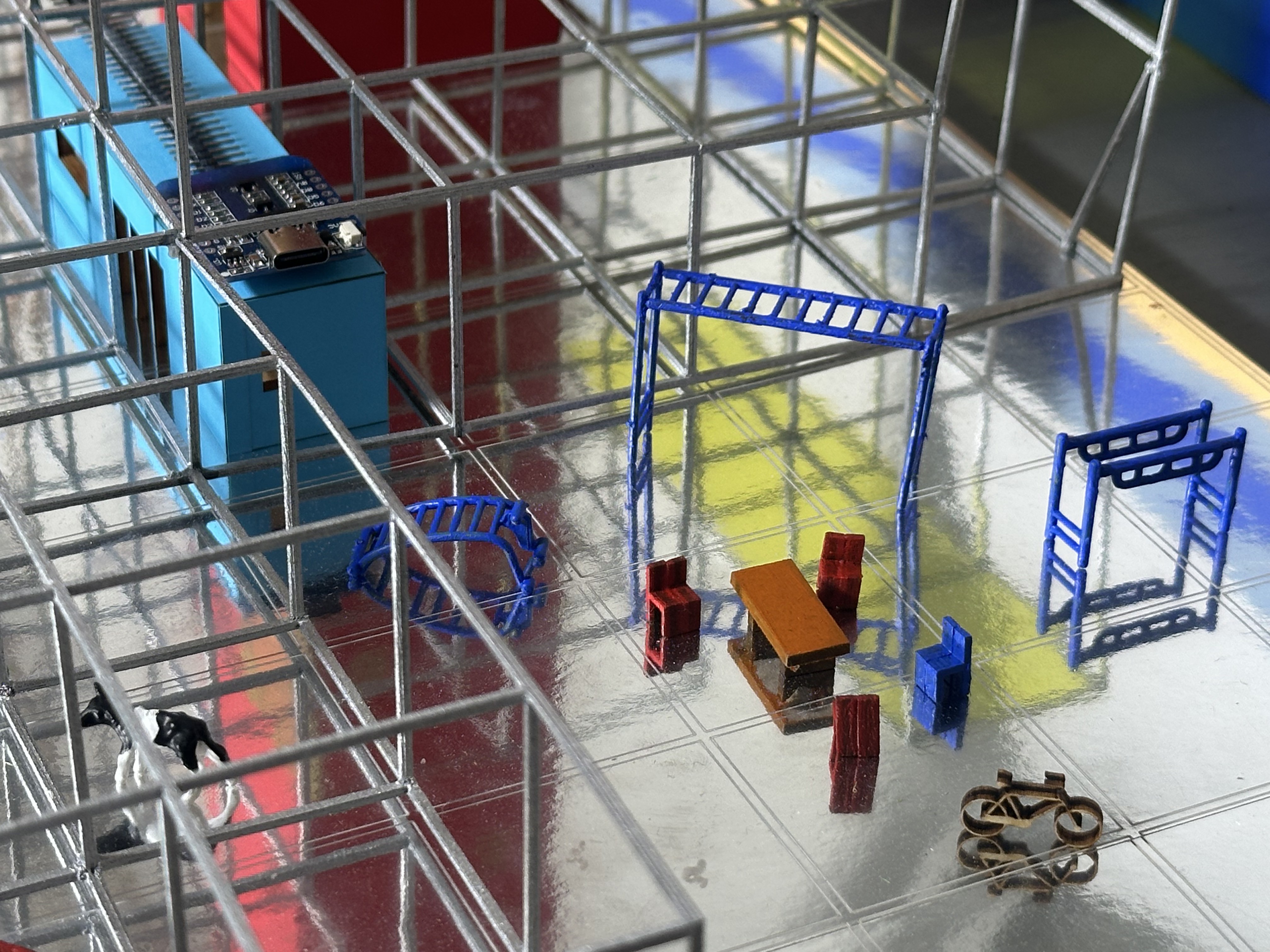 Vidigulfo model detail with metal scaffold, mesh platforms and grazing field