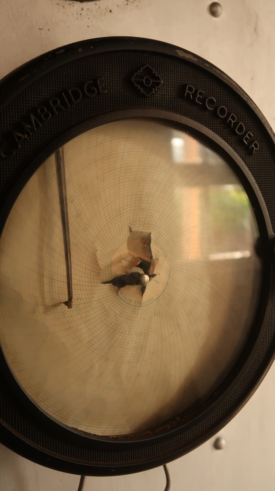 Cambridge recorder dial with torn paper chart
