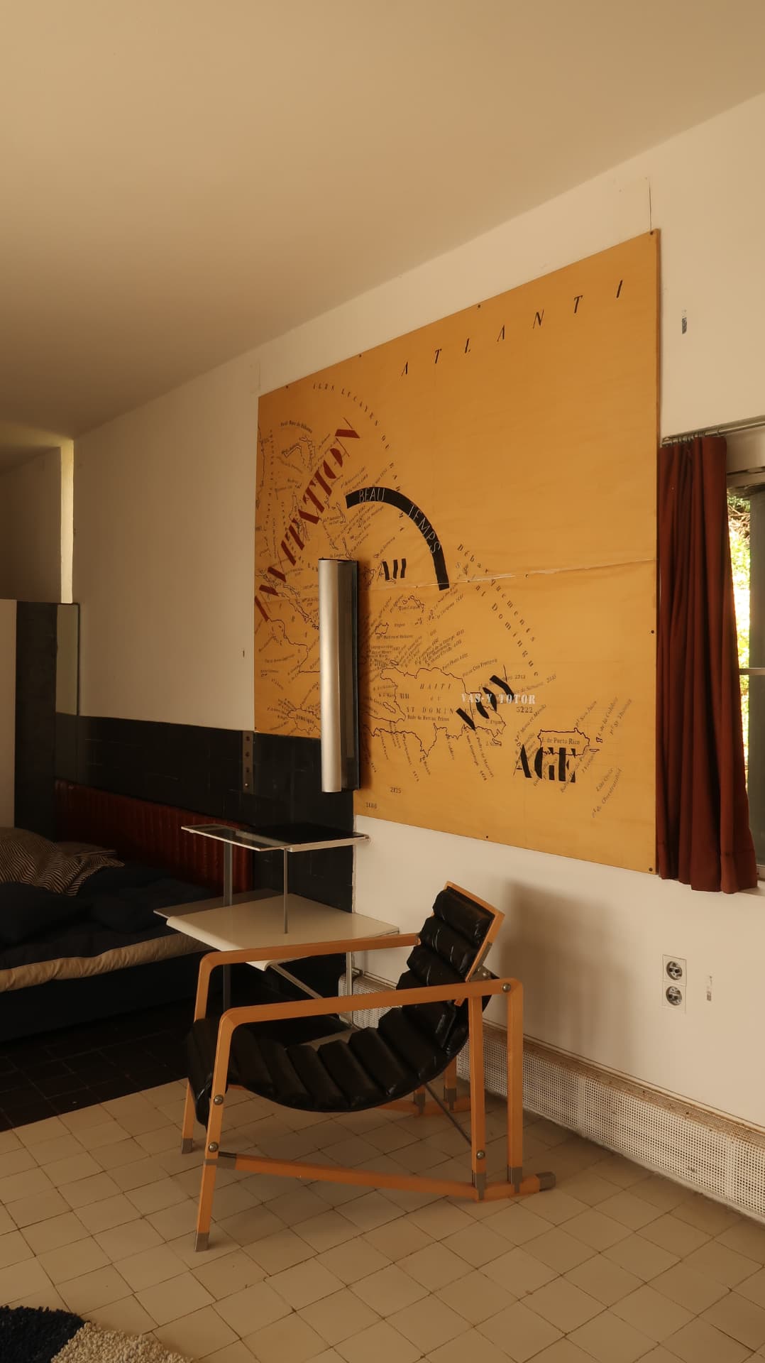 Modernist interior with a painted nautical chart mural