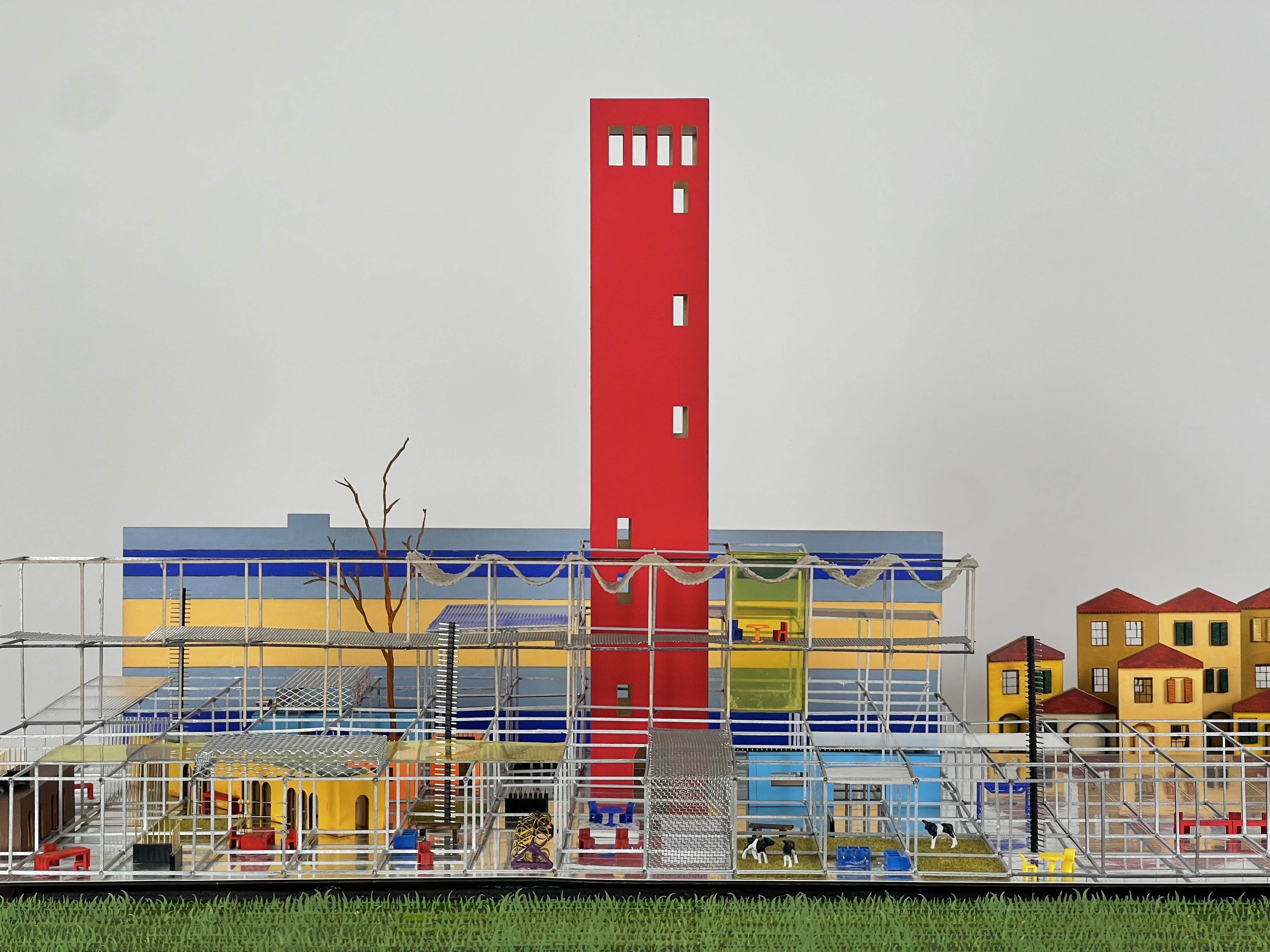 Close-up of the Vidigulfo model showing translucent yellow walkways and coloured volumes